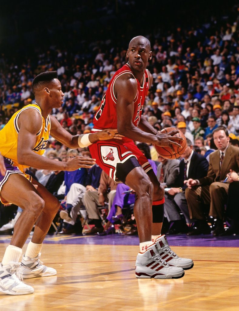 Ballislife - #TBT Michael Jordan wearing Converse and Adidas shoes