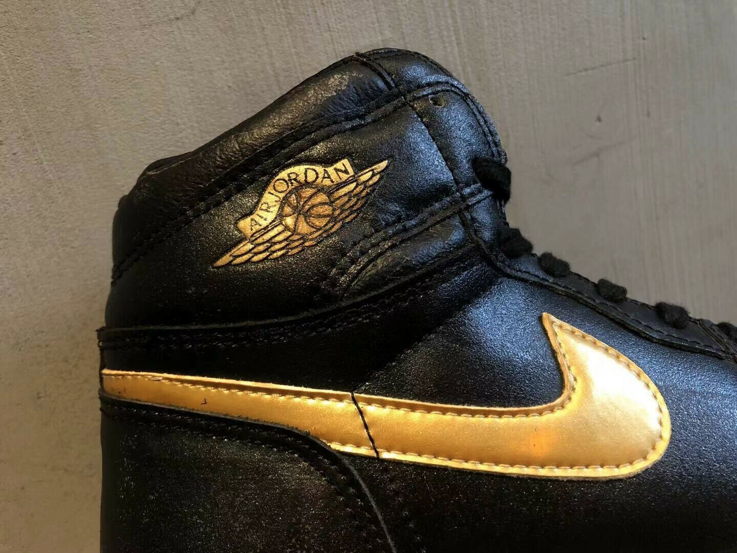 jordan 1 black and gold patent