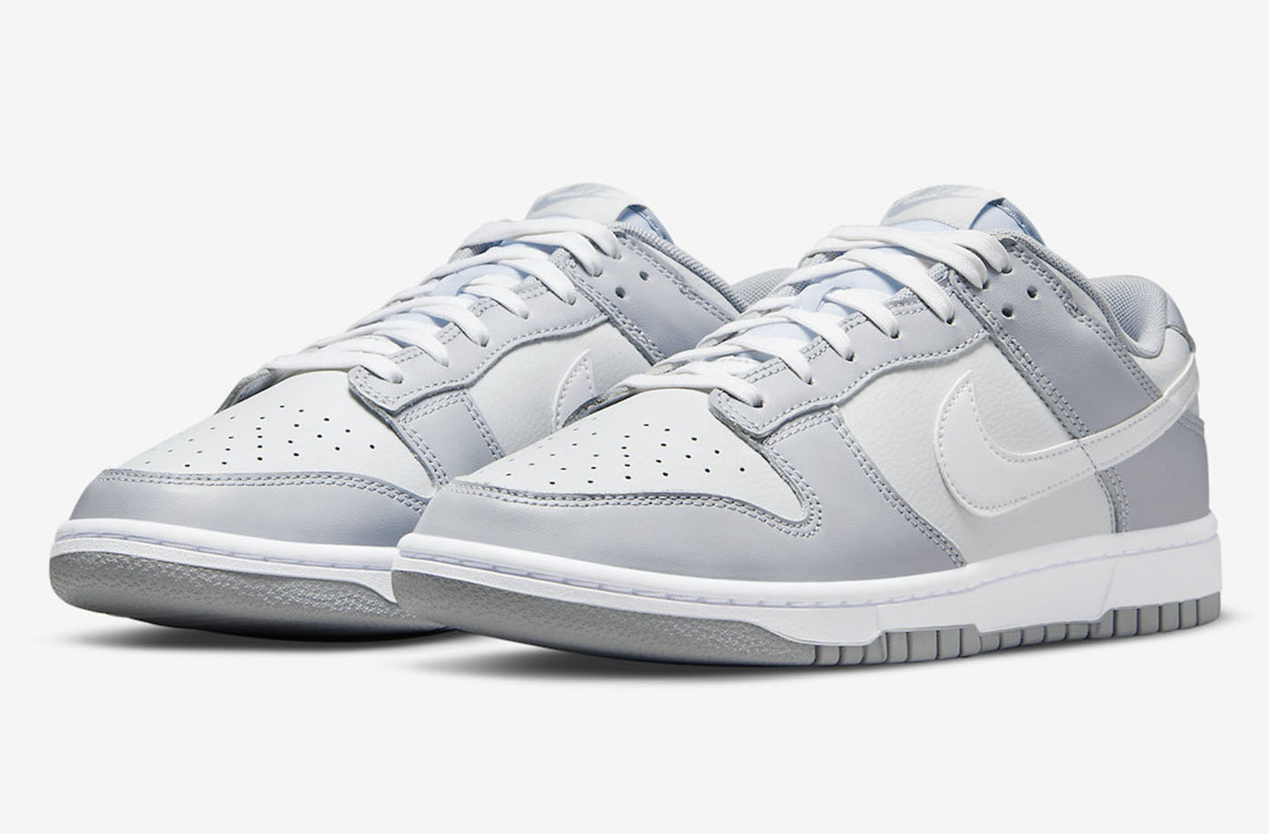 The Nike Dunk Low Surfaces In Grey and White | SoleSavy